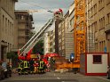 Person auf Baukran Koeln Christophstr P127